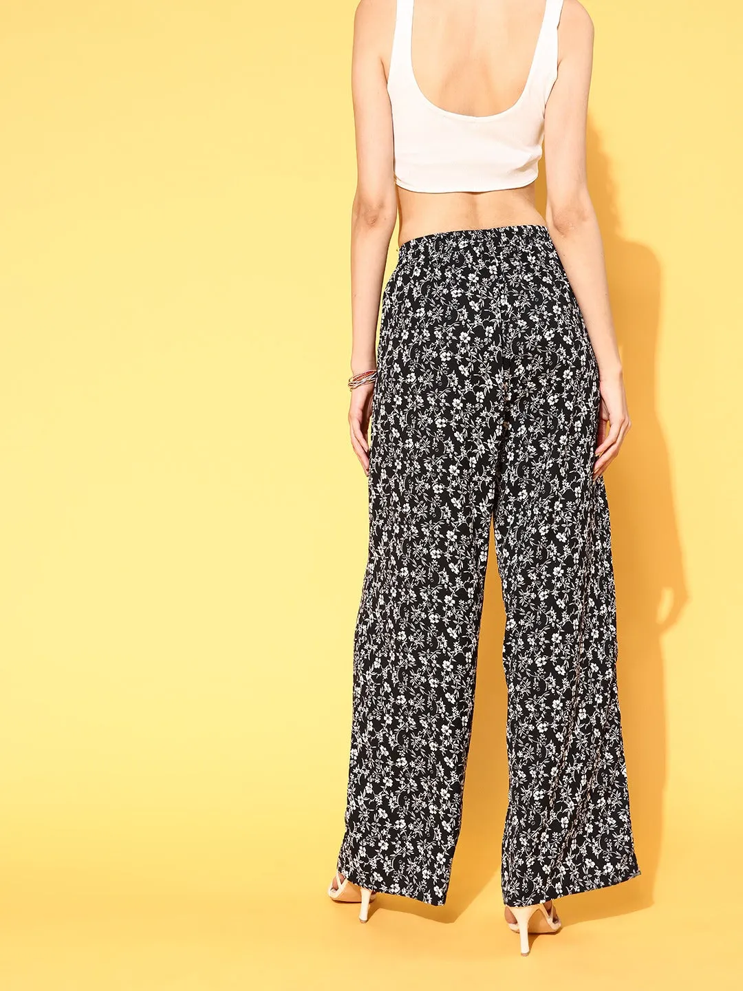 Berrylush Women Black & White Floral Printed High-Rise Waist Wide Leg Flared Trousers