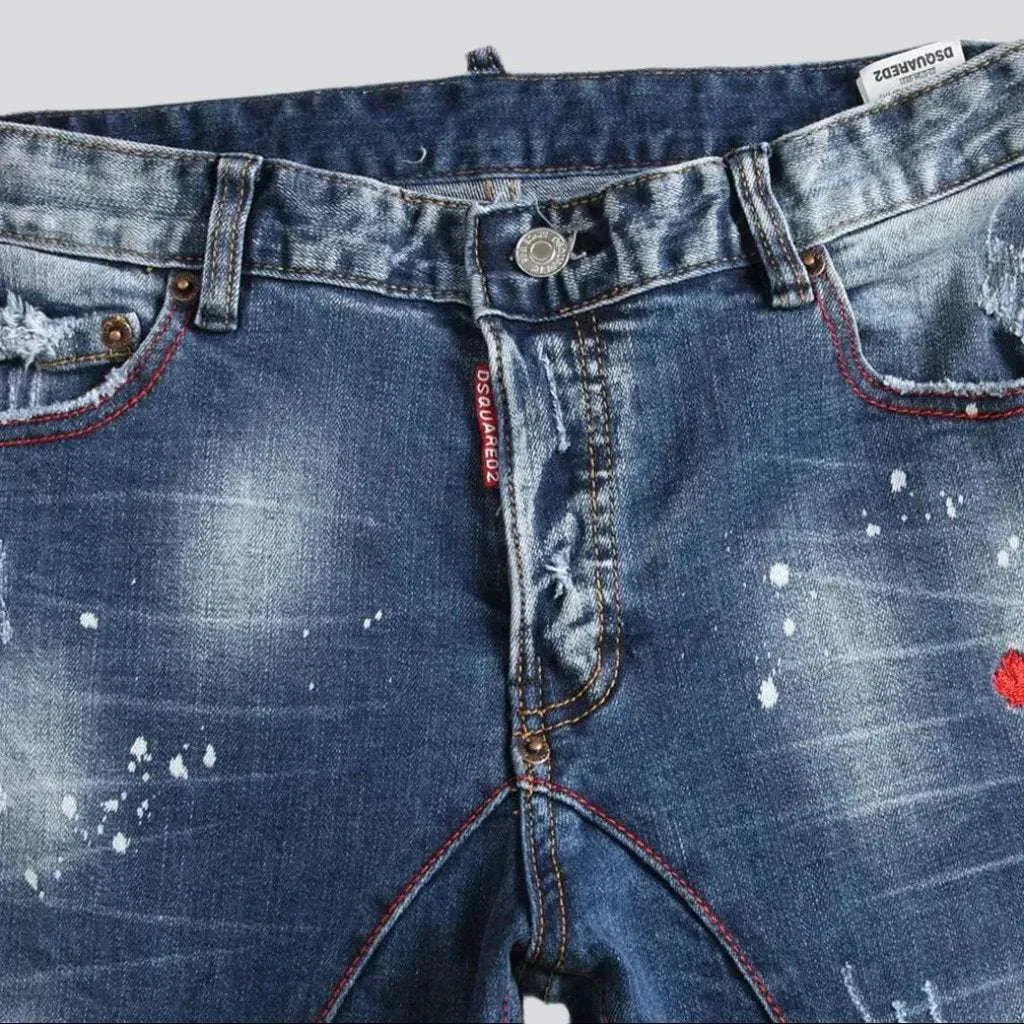 Mid-waist men's paint-splatter jeans