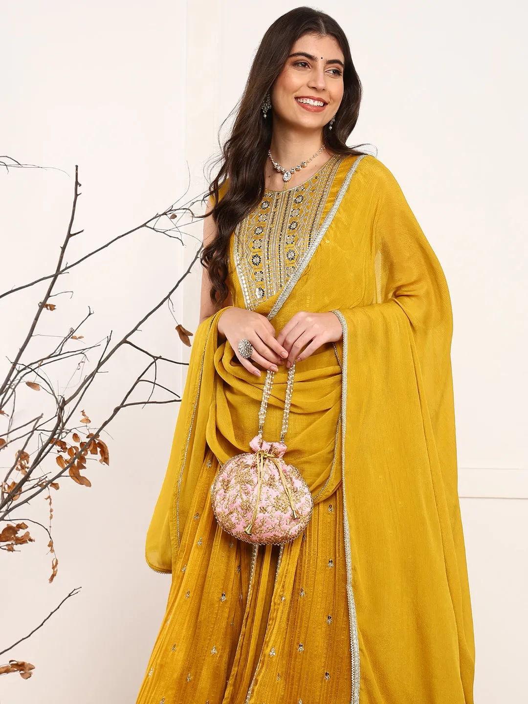 Women Mustard Silk Blend Solid Embroidered A-Line Kurta Trouser With Dupatta